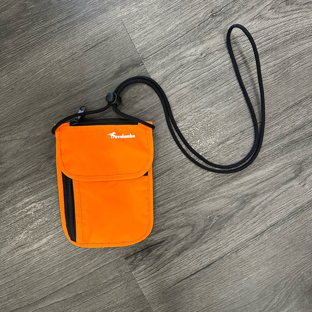 Orange concealable travel wallet - new and never used